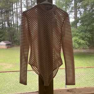 Forever 21 Nude body suit. Size L. NWT.